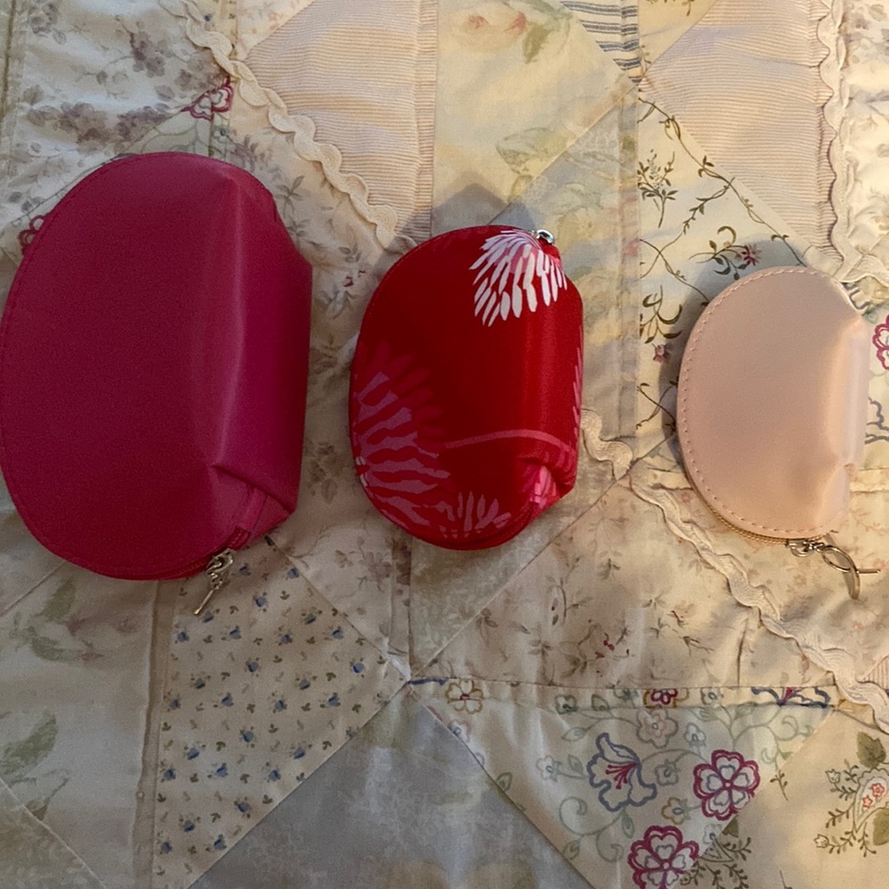 3 small makeup bags.